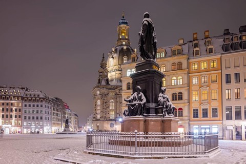 The old town centre of Dresden with its historic buildings. Neumarkt with monument to King