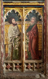 Medieval paintings of saints on rood screen inside church of Saint Andrew, Bramfield, Suffolk,