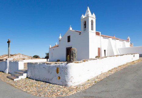 Whitewashed building rural country village catholic church Igreja Santa Barbara de Padroes, near