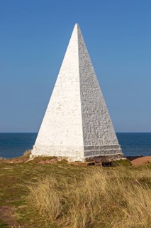 Emmanuel Head white pyramidal navigation beacon, Holy Island, Northumberland, England, UK built