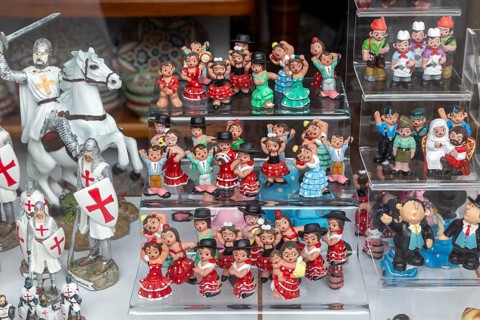 Typical Spanish souvenir products on display in shop window, Frigiliana, Axarquia, Andalusia,