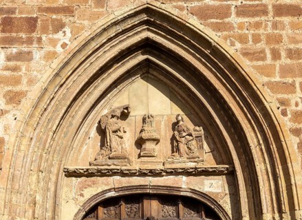 Aragonese Gothic architectural style carvings around doorway, Santa Maria la Mayor, Ezcaray, La