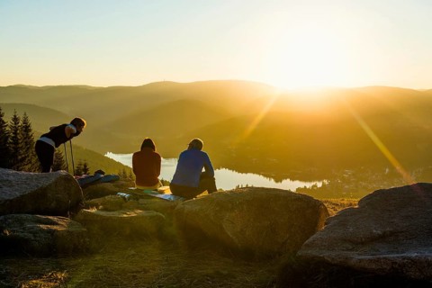 Hiking group, view from Hochfirst to Titisee and Feldberg, sunset, near Neustadt, Black Forest,