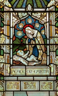 Church of All Saints, Great Glemham, Suffolk, England, UK stained glass window Peace on Earth by