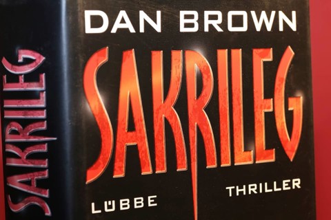 Close-up of the novel Sacrilege by Dan Brown