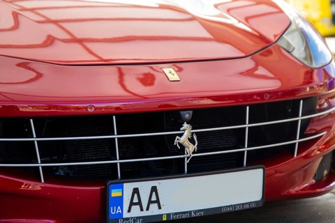 Close-up of a red Ferrari FF (seen at the Ellwanger Berge motorway service area,