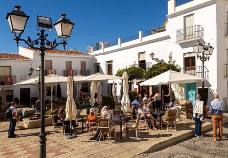 People and cafes in church square plaza, Plaza de la Iglesia, Frigiliana, Axarquia, Andalusia,