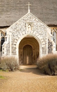 Entrance porch doorway village parish church and churchyard, Saint Mary, Henstead, Suffolk,