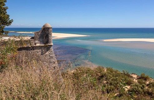 Coastal wooded landscape of pristine beaches and lagoon behind offshore sandbar, Cacela Velha, Vila