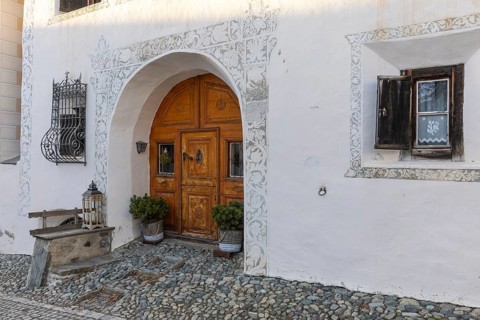 Entrance door, window, historic house, sgraffito, facade decorations, Guarda, Engadin, Grisons,