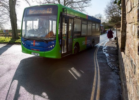 Green single decker service to Marlborough Swindon bus company bus at Avebury, Wiltshire, England,