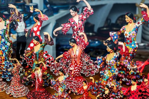 Flamenco dancers Spanish souvenir products on display in shop window, Frigiliana, Axarquia,