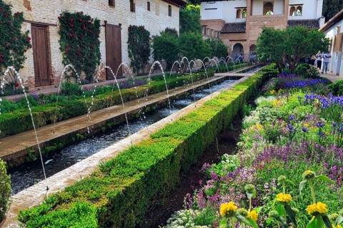 Tourists in the Patio de la Acequia, gardens with water basin, water features, Generalife Gardens,