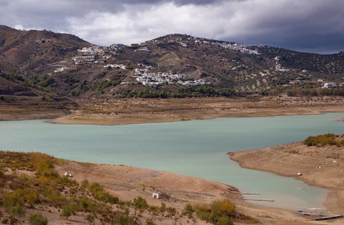 Lake Vinuela reservoir at low water level view from Hotel La Vinuela, Axarquia, Andalusia, Spain