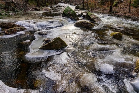 Severe frost has formed bizarre ice formations in the riverbed of the Gottleuba, Bergieshuebel,