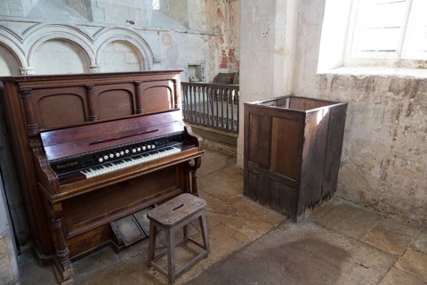 Historic interior of church of Saint John, Inglesham, Wiltshire, England, UK under the care of the