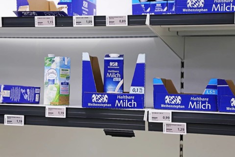 Empty milk shelf in a supermarket in Germany