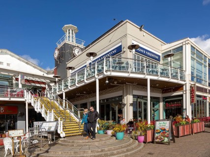 Leisure buildings and restaurants Cardiff Bay redevelopment at Mermaid Quay, Cardiff, South Wales,