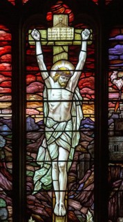 Stained glass window detail church of Saint Mary, Martlesham, Suffolk, England, UK, Crucifixion of