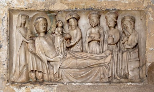 Relief carving of the Adoration of the Magi, dated to 1350, Holy Trinity Church, Long Melford,