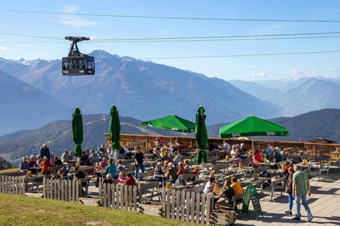 Rosshuette mountain station in Seefeld/Tyrol. Many tourists and locals take advantage of the sunny