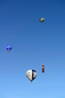 Four hot air balloons in the blue sky, Montgolfiade Tegernseer Tal, Balloon Week Tegernsee,