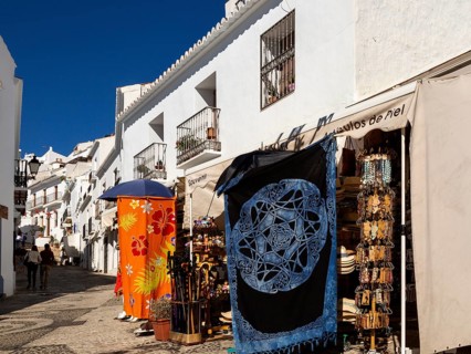 Souvenir shop with clothing and craftwork on display, Frigiliana, Axarquia, Andalusia, Spain,