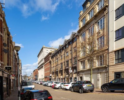Large nineteenth century buildings being convert to apartments and offices, Butetown, Cardiff Bay,