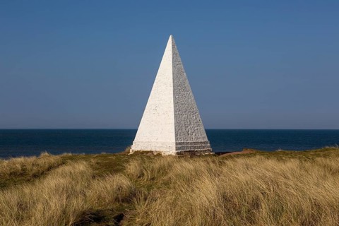 Emmanuel Head white pyramidal navigation beacon, Holy Island, Northumberland, England, UK built