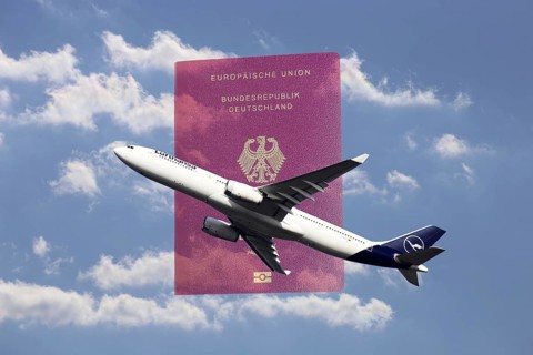 Symbolic image: Lufthansa passenger aircraft taking off, in the background a passport of the