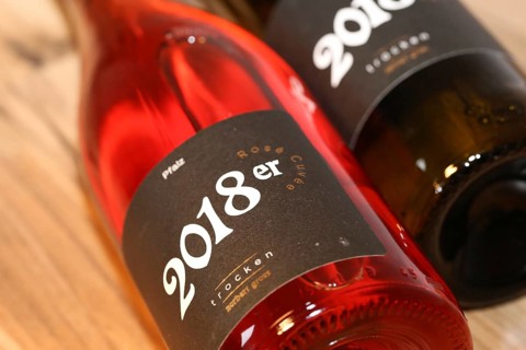 Close-up of two horizontal wine bottles from the Norbert Gross winery in Meckenheim (Palatinate)