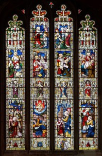 Stained glass window East Bergholt church, Suffolk, England, UK, five tiers of biblical scenes c