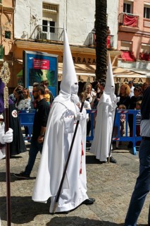 Semana Santa, procession with Nazarenos and tourists, celebrations in Cadiz, Spain, Europe
