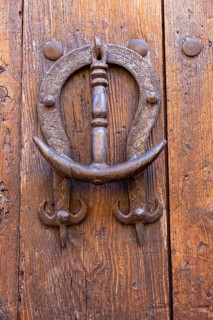 Architectural detail old iron house door knocker, Siguenza, Guadalajara province, Spain, Europe