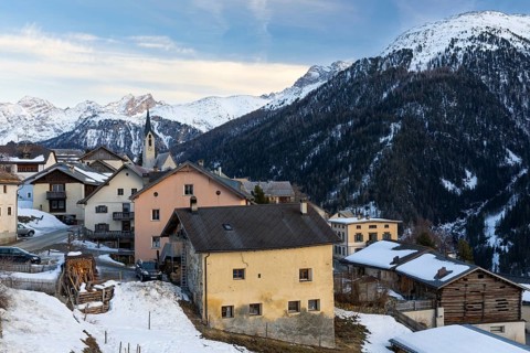 Historic village in front of a mountain peak, snow, winter, Guarda, Engadin, Grisons, Switzerland,