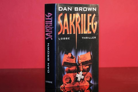 Close-up of the novel Sacrilege by Dan Brown