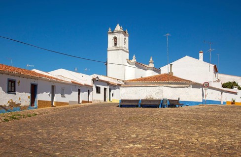 Small traditional rural settlement village with low rise one story houses and cobbled streets,