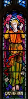 Stained glass window of Angel Gabriel, Great Cheverell, Wiltshire, England, Uk Mary Lowndes 1920