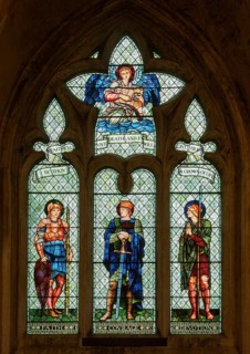 Stained glass window in Malmesbury abbey, Wiltshire, England, UK, Faith, Courage, Devotion by