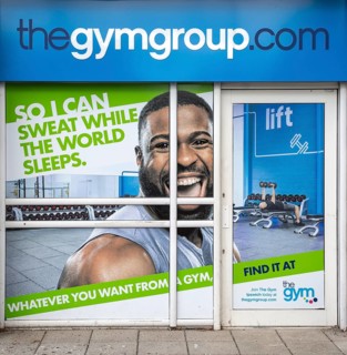 The Gym Group advertising poster, Cardinal Park, Ipswich, Suffolk, England, UK