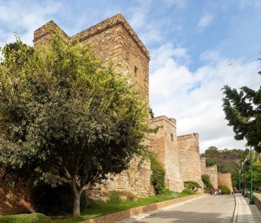 Historic walled defences to Moorish citadel fortress palace of the Alcazaba, Malaga, Andalusia,
