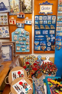 Close up tourist souvenir products on sale including fridge magnets, city of Evora, Alto Alentejo,