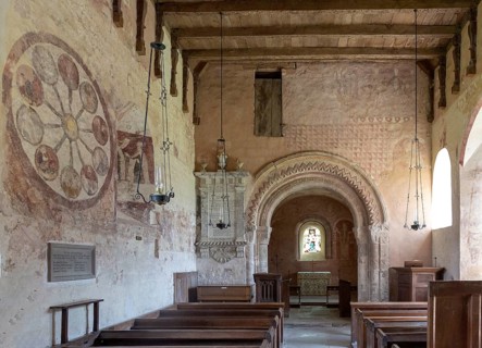 Medieval frescoes church of Saint Mary, Kempley, Gloucestershire, England, UK, Norman chancel arch