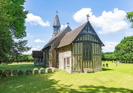 Village parish church of All Saints, Crowfield, Suffolk, England, UK with wooden timber framed