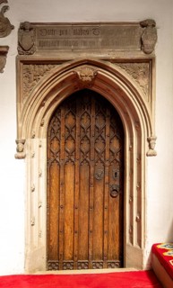 Interior of church of Saint Mary, Halesworth, Suffolk, England, UK, Vestry door dating from late