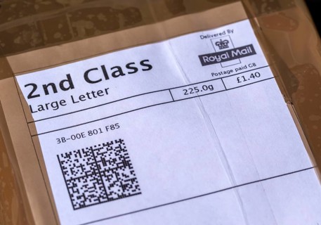 Close up Royal Mail 2nd Class Large Letter postage paid label, UK