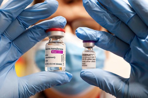 Vaccination vials with the Covid19 Biontech Pfizer vaccine Comirnaty and the Covid19 vaccine Astra