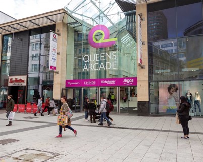 Entrance to Queens Arcade shopping centre, Queen Street, Cardiff, South Wales, UK