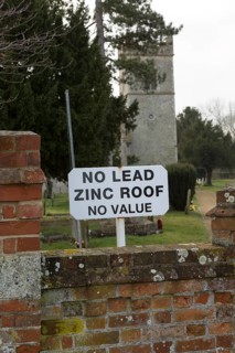 No Lead Zinc Roof No Value sign outside church to deter potential thieves who target churches for