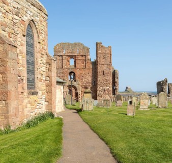 Ruins of Lindisfarne priory Holy Island, Northumberland, England, UK